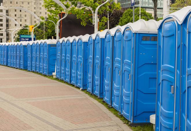 a row of sleek and modern portable restrooms at a special outdoor event in Brighton, MA